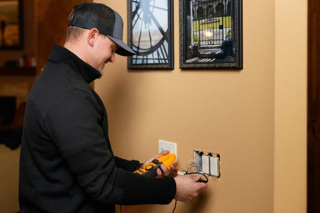 Kennewick electrician checking power outlets Crimson Power LLC