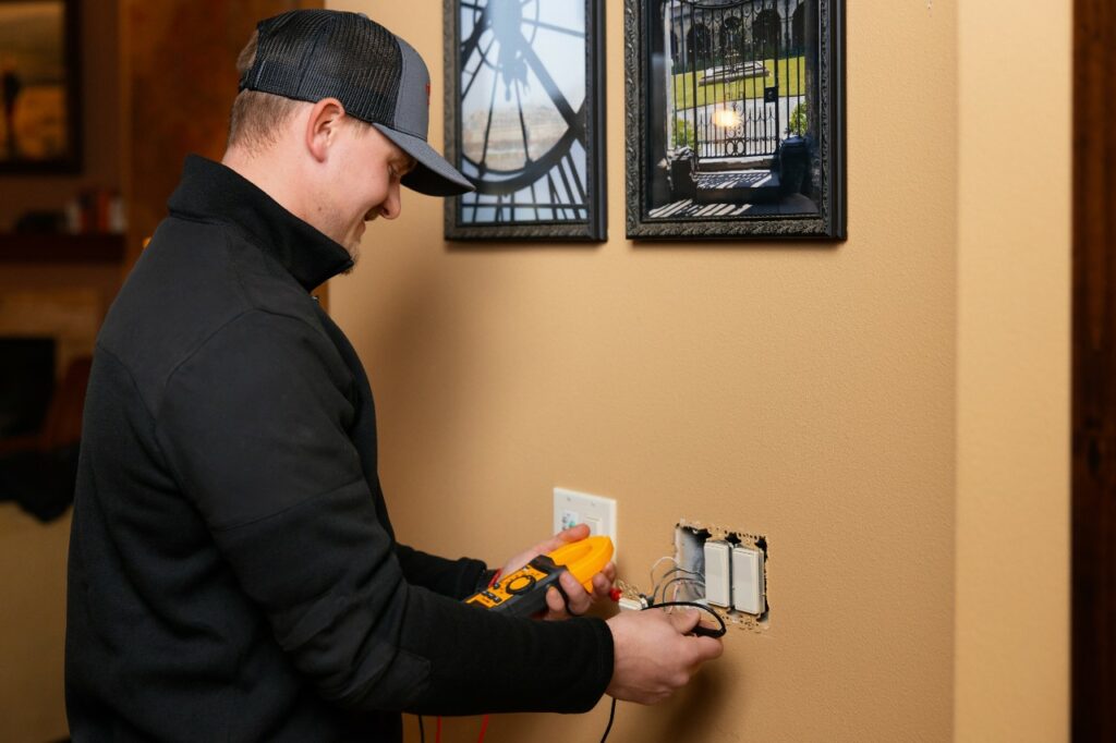 electrician testing voltage from Crimson Power